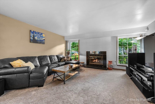2116 Glasgow Ct, Hanover Park, IL 60133 - carpeted living area featuring a glass covered fireplace