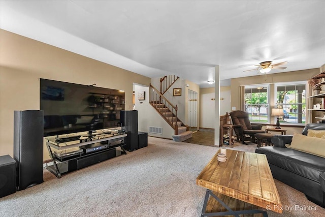 2116 Glasgow Ct, Hanover Park, IL 60133 - living area featuring carpet, stairs, and ceiling fan
