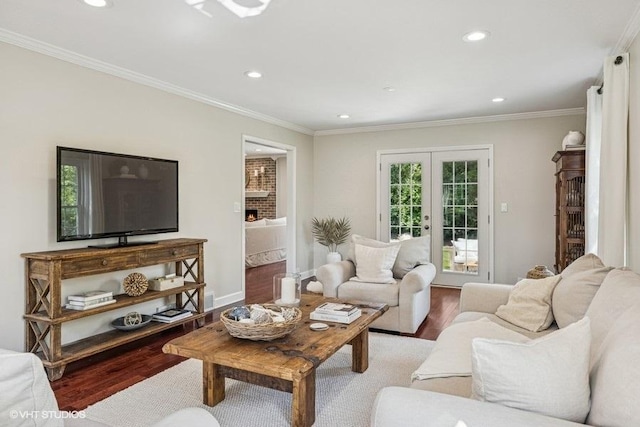 7536 Inverway Dr, Lakewood, IL 60014 - living area with wood finished floors, recessed lighting, french doors, and crown molding
