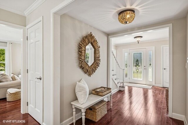 7536 Inverway Dr, Lakewood, IL 60014 - foyer featuring dark wood-style flooring, ornamental molding, stairway, and a chandelier