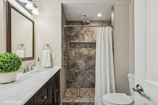 7536 Inverway Dr, Lakewood, IL 60014 - full bathroom featuring vanity and tiled shower