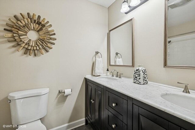 7536 Inverway Dr, Lakewood, IL 60014 - bathroom with double vanity and toilet