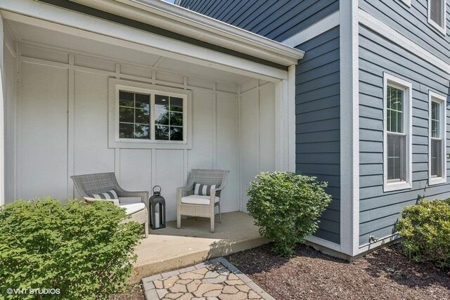7536 Inverway Dr, Lakewood, IL 60014 - property entrance featuring board and batten siding