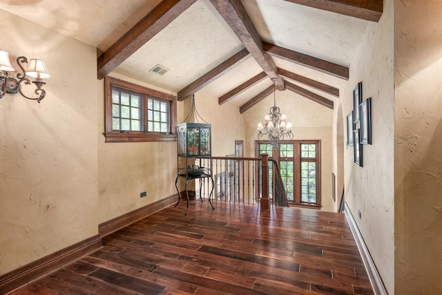21 Forest Ave, Naperville, IL 60540 - unfurnished room featuring a chandelier, hardwood / wood-style floors, healthy amount of natural light, a textured wall, and baseboards
