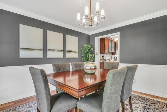 347 Yorkshire Dr, Mundelein, IL 60060 - dining area with a chandelier, wood finished floors, ornamental molding, and baseboards