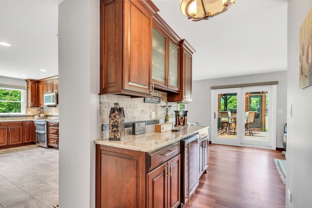 347 Yorkshire Dr, Mundelein, IL 60060 - indoor bar featuring stainless steel appliances, beverage cooler, decorative backsplash, a chandelier, and recessed lighting