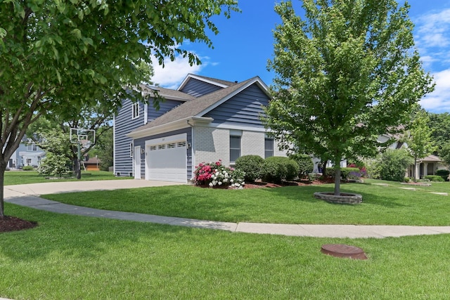 347 Yorkshire Dr, Mundelein, IL 60060 - view of front of home featuring a front yard, a garage, driveway, brick siding, and roof with shingles