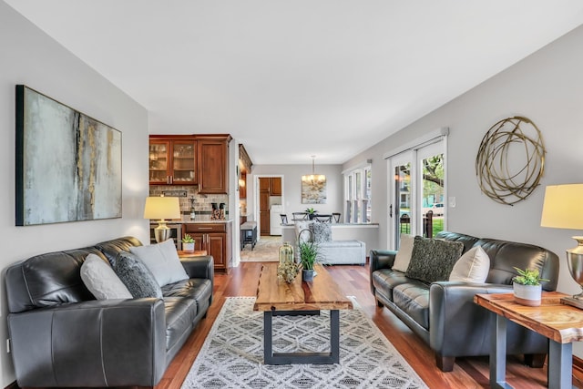 347 Yorkshire Dr, Mundelein, IL 60060 - living room featuring wood finished floors and a chandelier