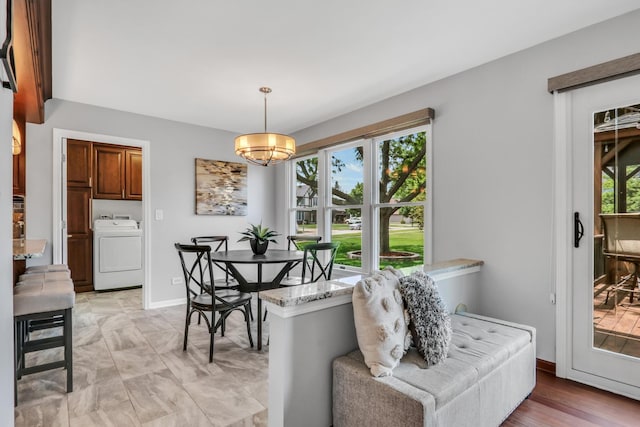 347 Yorkshire Dr, Mundelein, IL 60060 - dining room featuring washer / clothes dryer and a chandelier