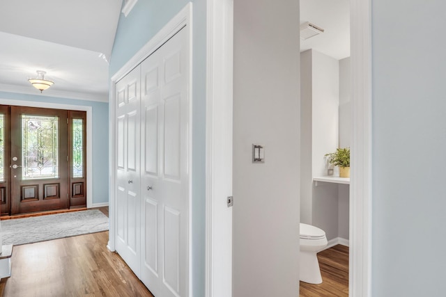 347 Yorkshire Dr, Mundelein, IL 60060 - entrance foyer with wood finished floors, baseboards, and crown molding