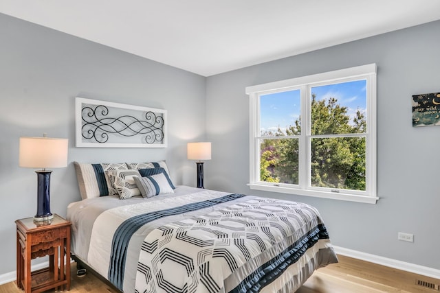 347 Yorkshire Dr, Mundelein, IL 60060 - bedroom featuring wood finished floors and baseboards