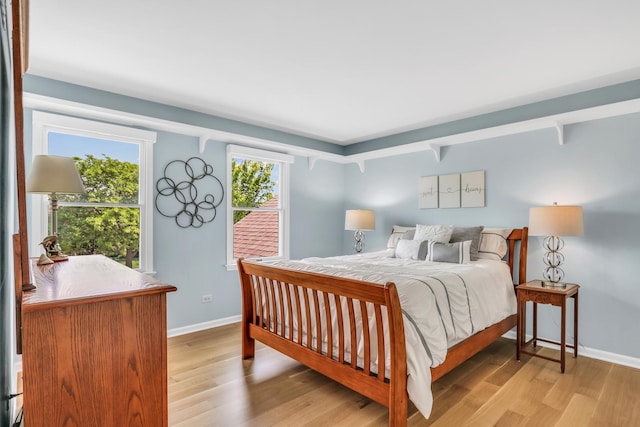 347 Yorkshire Dr, Mundelein, IL 60060 - bedroom with light wood-style floors and baseboards