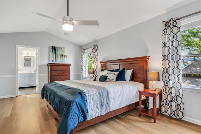 347 Yorkshire Dr, Mundelein, IL 60060 - bedroom with lofted ceiling, multiple windows, wood finished floors, ensuite bathroom, and baseboards
