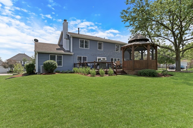 347 Yorkshire Dr, Mundelein, IL 60060 - back of house with a gazebo, a chimney, a yard, and a deck