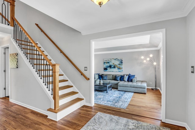347 Yorkshire Dr, Mundelein, IL 60060 - stairway featuring ornamental molding, wood finished floors, and baseboards