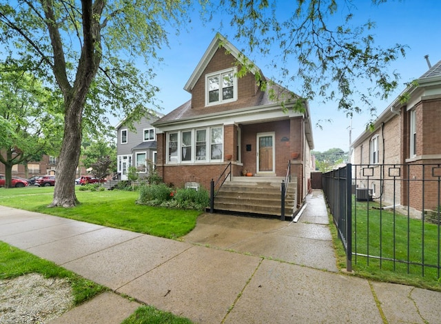 4646 W Montana St, Chicago, IL 60639 - bungalow-style house with brick siding and central AC unit