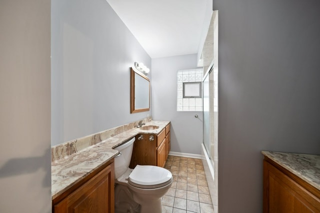 4646 W Montana St, Chicago, IL 60639 - full bathroom featuring toilet, an enclosed shower, vanity, tile patterned flooring, and baseboards