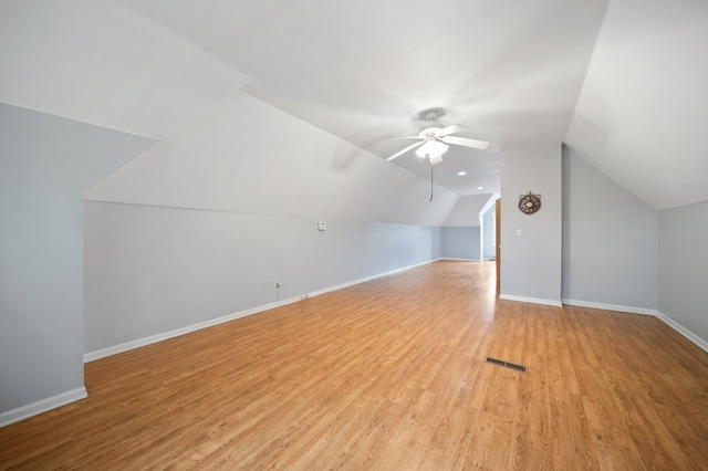 4646 W Montana St, Chicago, IL 60639 - bonus room featuring ceiling fan, light wood-type flooring, vaulted ceiling, and baseboards