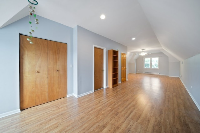 4646 W Montana St, Chicago, IL 60639 - bonus room with vaulted ceiling, a baseboard radiator, light wood finished floors, baseboards, and a ceiling fan
