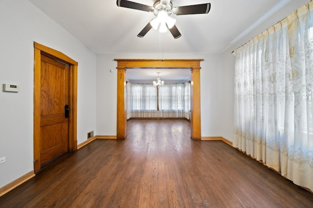 4646 W Montana St, Chicago, IL 60639 - unfurnished room with a chandelier, dark wood-type flooring, baseboards, and a ceiling fan