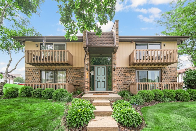 213 Vine St Unit 3, New Lenox, IL 60451 - view of front of house with a balcony and brick siding