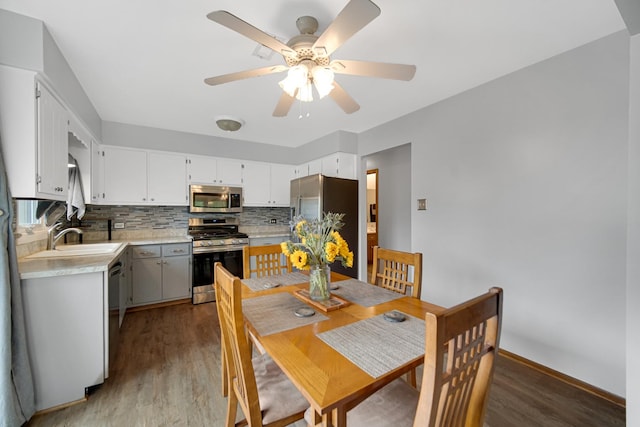 213 Vine St Unit 3, New Lenox, IL 60451 - dining space featuring wood finished floors, a ceiling fan, and baseboards