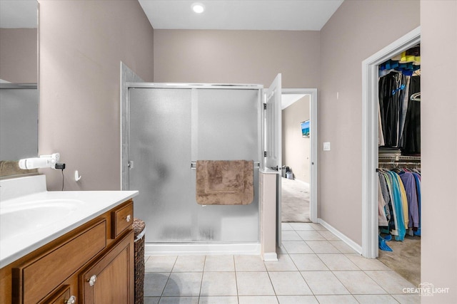 1920 Glenwood Cir Unit B, Sugar Grove, IL 60554 - full bathroom featuring vanity, a stall shower, and a spacious closet