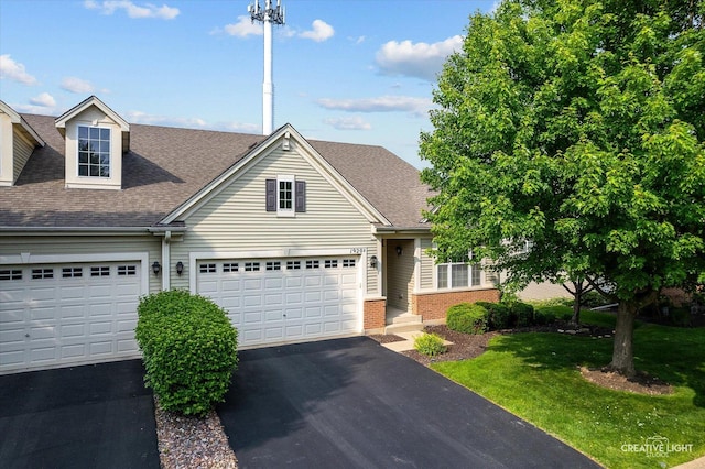 1920 Glenwood Cir Unit B, Sugar Grove, IL 60554 - view of front facade with roof with shingles, driveway, a front lawn, and brick siding