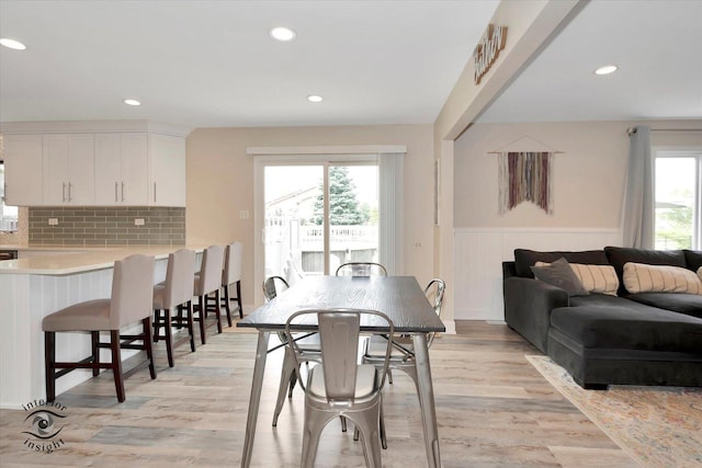 8456 Meadows Edge Trl, Tinley Park, IL 60487 - dining room featuring wainscoting, healthy amount of natural light, light wood-style flooring, and recessed lighting