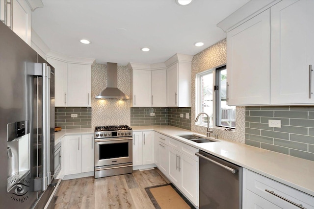 8456 Meadows Edge Trl, Tinley Park, IL 60487 - kitchen featuring wall chimney range hood, high quality appliances, white cabinetry, light countertops, and recessed lighting