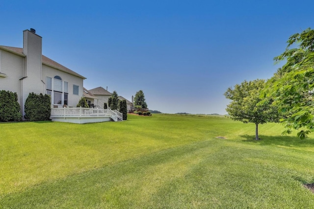 27117 Ashgate Xing, Plainfield, IL 60585 - view of grassy yard with a wooden deck