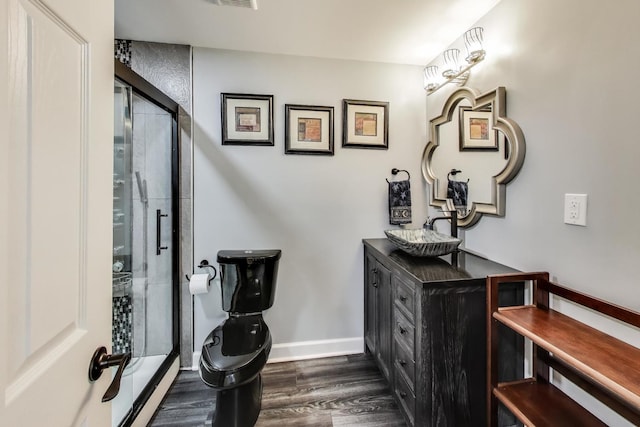 27117 Ashgate Xing, Plainfield, IL 60585 - bathroom with wood finished floors, a stall shower, and vanity