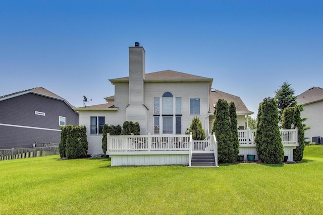 27117 Ashgate Xing, Plainfield, IL 60585 - rear view of house with a deck, a chimney, and roof with shingles