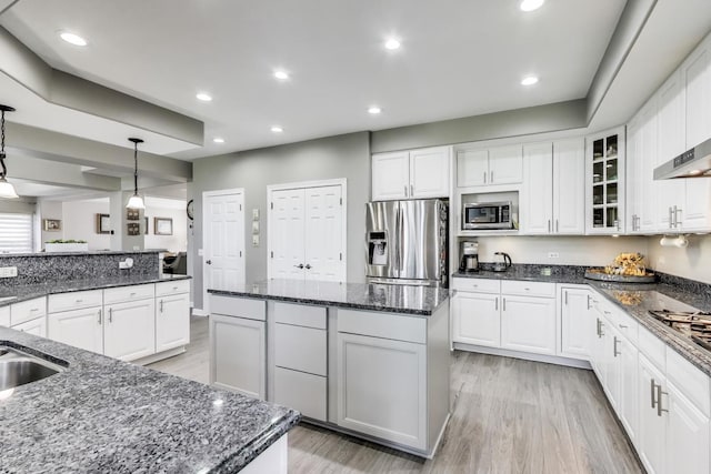 27117 Ashgate Xing, Plainfield, IL 60585 - kitchen with stainless steel appliances, a kitchen island, light wood-type flooring, white cabinets, and recessed lighting
