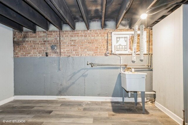 3411 W 59th St, Chicago, IL 60629 - unfinished basement with wood finished floors and baseboards
