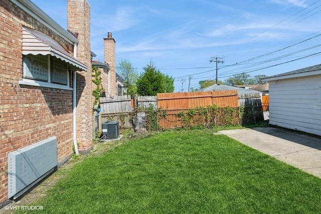 3411 W 59th St, Chicago, IL 60629 - view of yard with central AC unit