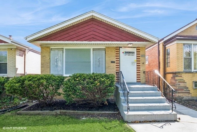 3411 W 59th St, Chicago, IL 60629 - view of front facade featuring brick siding