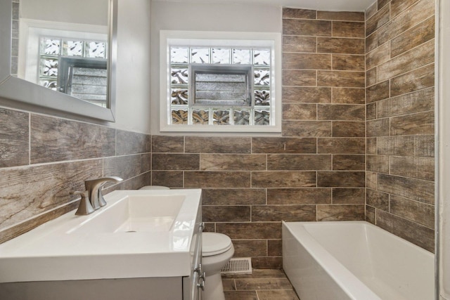 15123 Wabash Ave, South Holland, IL 60473 - full bathroom featuring tile walls, vanity, and toilet