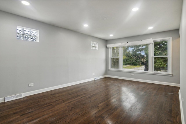 15123 Wabash Ave, South Holland, IL 60473 - spare room featuring recessed lighting, baseboards, and dark wood-type flooring
