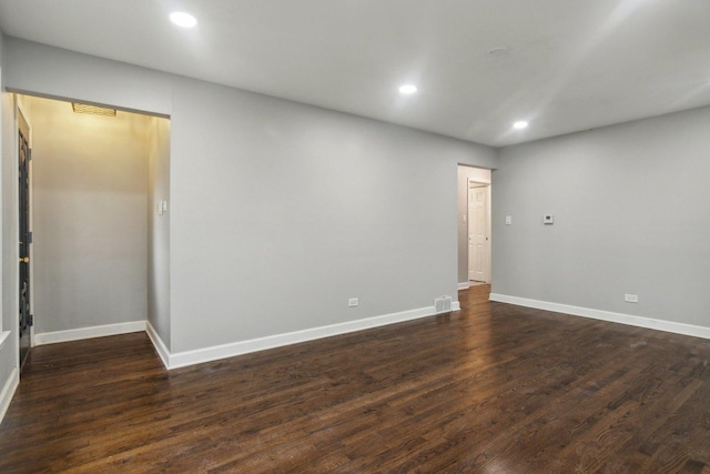 15123 Wabash Ave, South Holland, IL 60473 - unfurnished room with recessed lighting, baseboards, and dark wood-style flooring