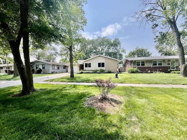17552 State Line Ave, Lansing, IL 60438 - ranch-style home featuring a front lawn, concrete driveway, brick siding, and an attached garage