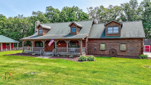 2622 E 28th Rd, Marseilles, IL 61341 - log cabin featuring log siding, a porch, a front yard, and a chimney