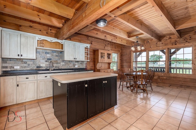 2622 E 28th Rd, Marseilles, IL 61341 - kitchen featuring a wood ceiling with exposed beams, light tile patterned floors, a center island, open shelves, and decorative backsplash
