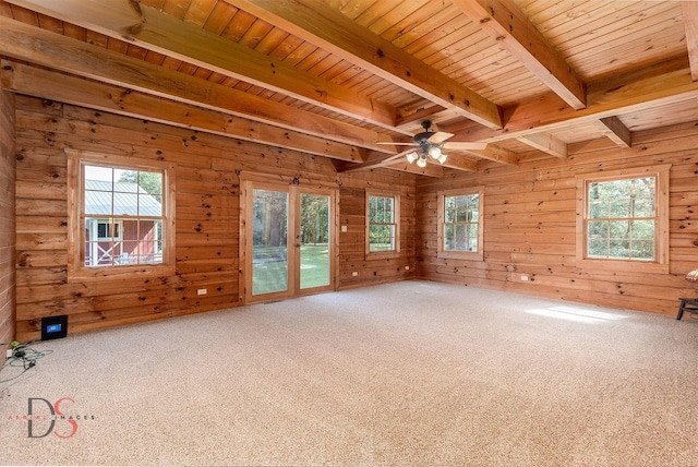 2622 E 28th Rd, Marseilles, IL 61341 - empty room featuring carpet flooring, wooden walls, french doors, healthy amount of natural light, and a wooden ceiling with exposed beams