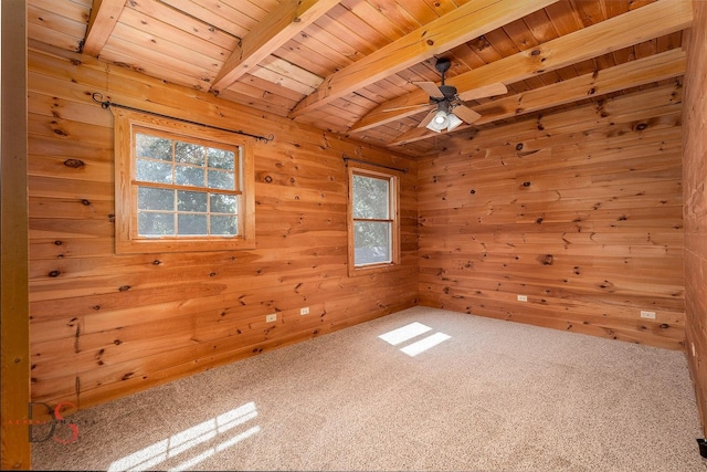 2622 E 28th Rd, Marseilles, IL 61341 - unfurnished room featuring a wooden ceiling with exposed beams, wooden walls, a ceiling fan, and carpet floors