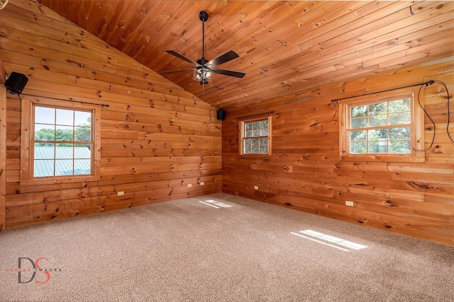 2622 E 28th Rd, Marseilles, IL 61341 - spare room featuring lofted ceiling, carpet, ceiling fan, wooden ceiling, and wood walls