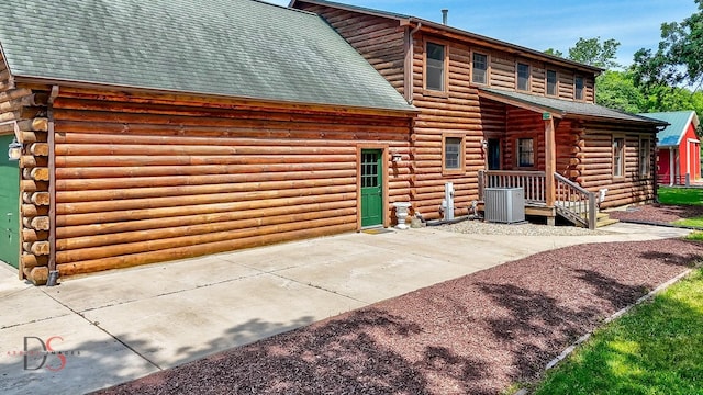 2622 E 28th Rd, Marseilles, IL 61341 - view of front facade with log exterior and roof with shingles