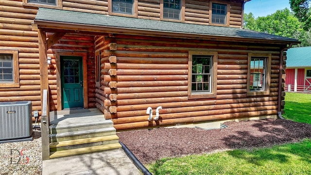 2622 E 28th Rd, Marseilles, IL 61341 - doorway to property with log siding and a shingled roof
