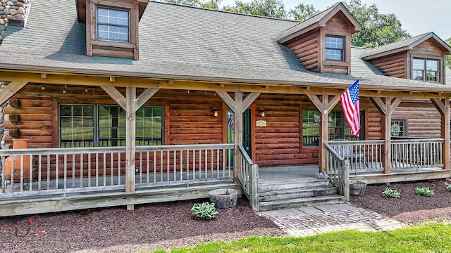 2622 E 28th Rd, Marseilles, IL 61341 - view of front facade with covered porch and log exterior