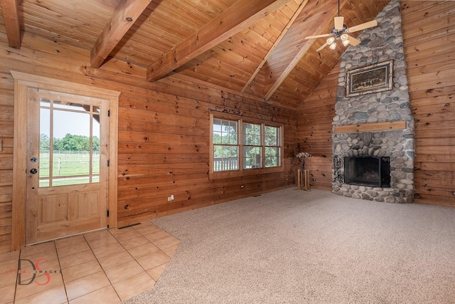 2622 E 28th Rd, Marseilles, IL 61341 - unfurnished living room with wooden ceiling, a stone fireplace, wood walls, and a ceiling fan